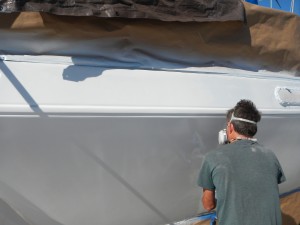 Tom priming the boat